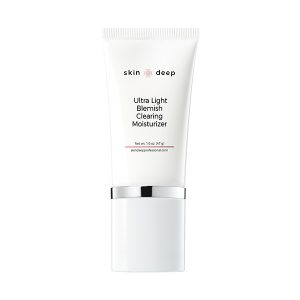 A white tube of Skin Deep Ultra Light Blemish Clearing Moisturizer with a silver band near the bottom. The product name is printed on the front in black text. The tube has a clean, minimalistic design.