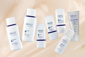 A collection of Obagi skincare products displayed on a white background, including cleansers, serums, and moisturizers