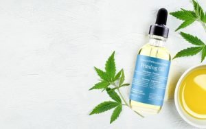 Epionce Priming Oil dropper bottle with hemp leaves and bowl.