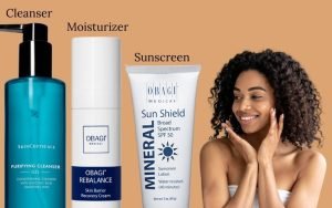 Woman smiling next to a sensitive skin dermatology routine: cleanser, moisturizer, and sunscreen.