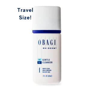 A small bottle of Obagi Nu-Derm Gentle Cleanser labeled as travel size.