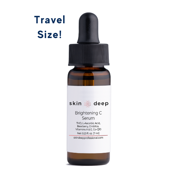 Small amber dropper bottle labeled Skin Deep Brightening C Serum with Travel Size! text.